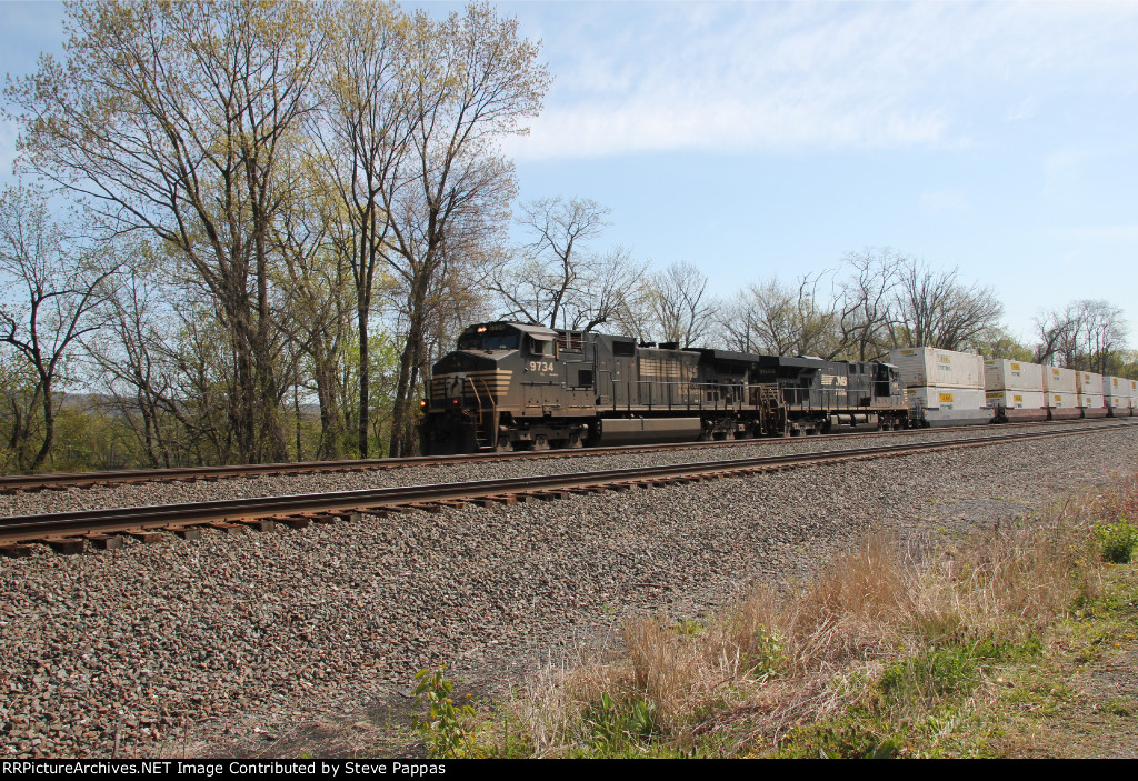 NS 9734 with a westbound stack train